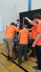 The team setting up the bot at the mini regional.
